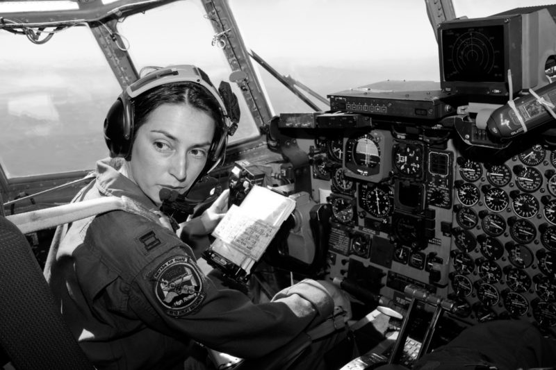 Female Military Reservist Pilot in a cockpit