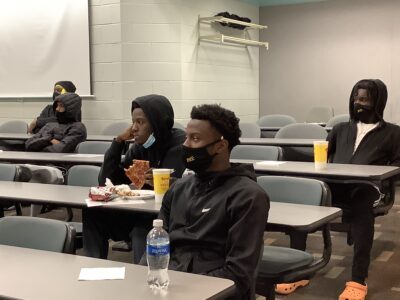 FTCC men's basketball players listen to a lesson during a life skills class