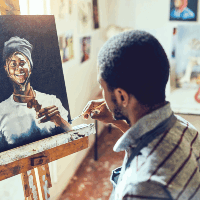 Picture of man painting.