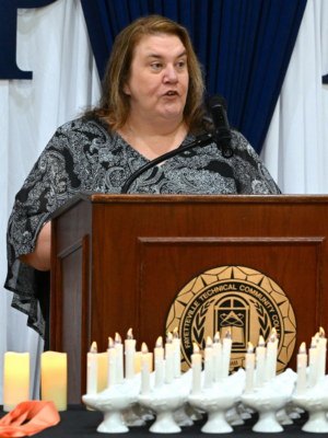 Dean Gallagher Speaking At Podium