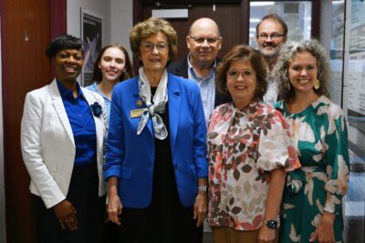 A group of people pose for a photo.