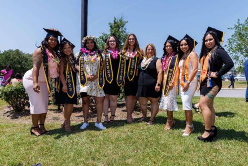 A-group-of-nursing-graduates-pose-together-outside-the-Expo-Center