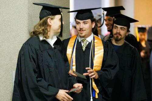 Graduates-chat-as-they-wait-to-enter-the-Crown