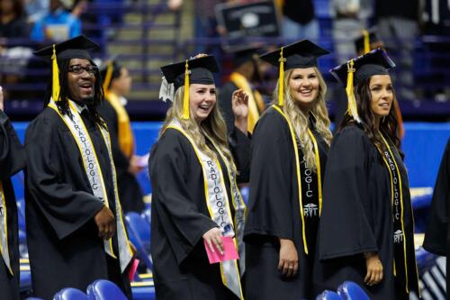 Graduates-laugh-as-they-enter-the-Crown