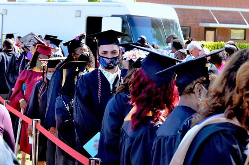 001 - FTCC graduates line up outside Tent A
