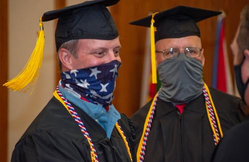 004 - Two graduates await the morning ceremony