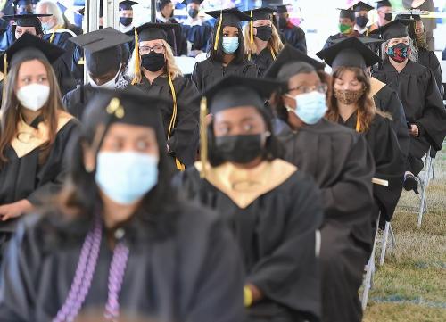 015 - Graduates watch the ceremony