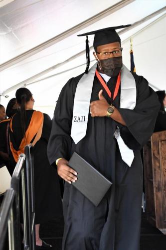 033 - A graduate gives the thumbs up