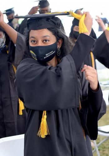 035 - A graduate turns her tassel