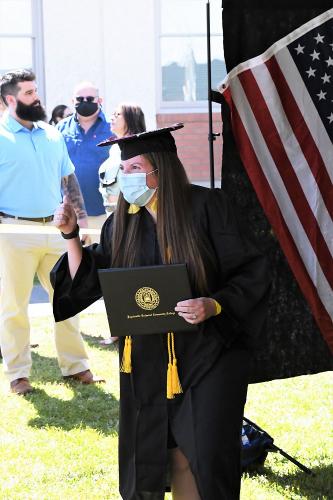 038 -A graduate gives the thumbs up