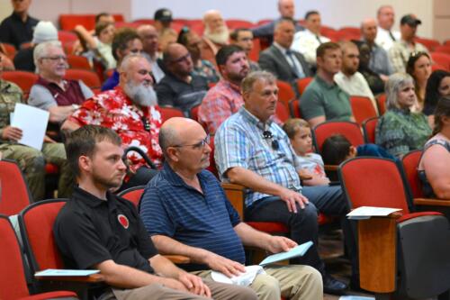 Supporters of the graduates sit in the audience.