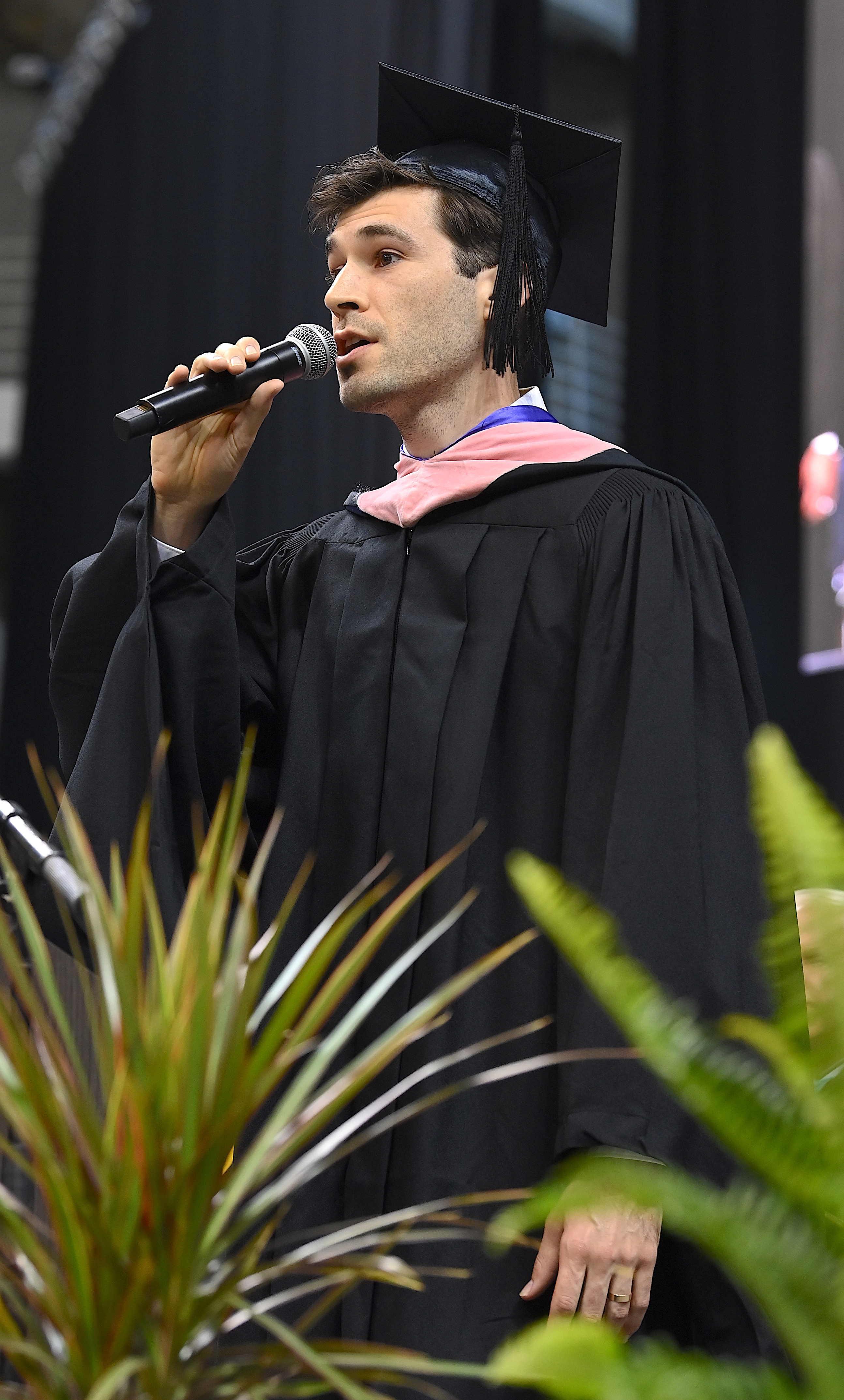 Alec Powers sings the national anthem.
