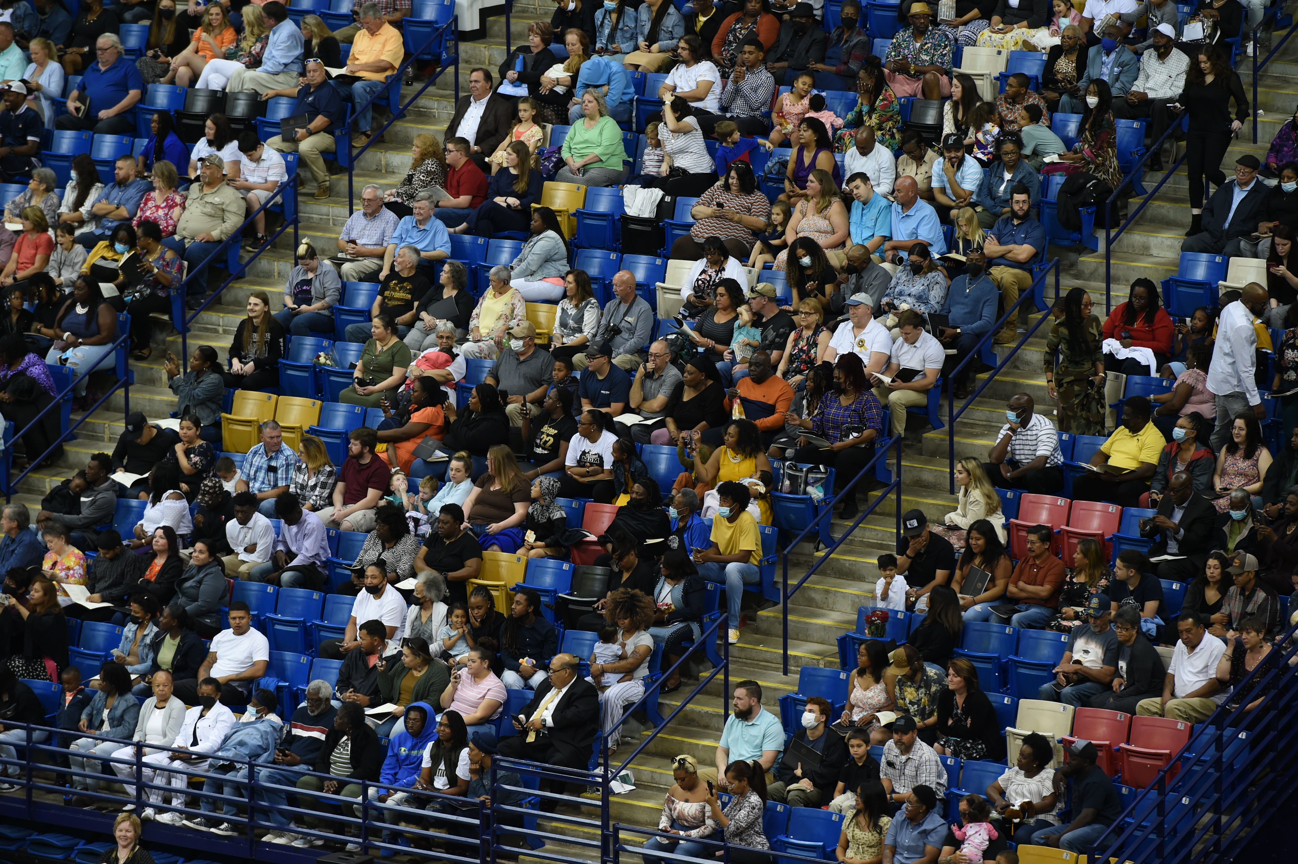 A wide photo of the crowd at graduation.