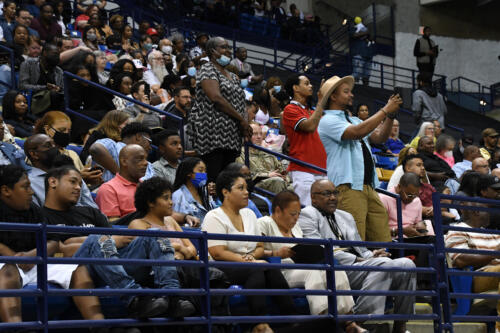 A wide photo of the crowd at graduation.