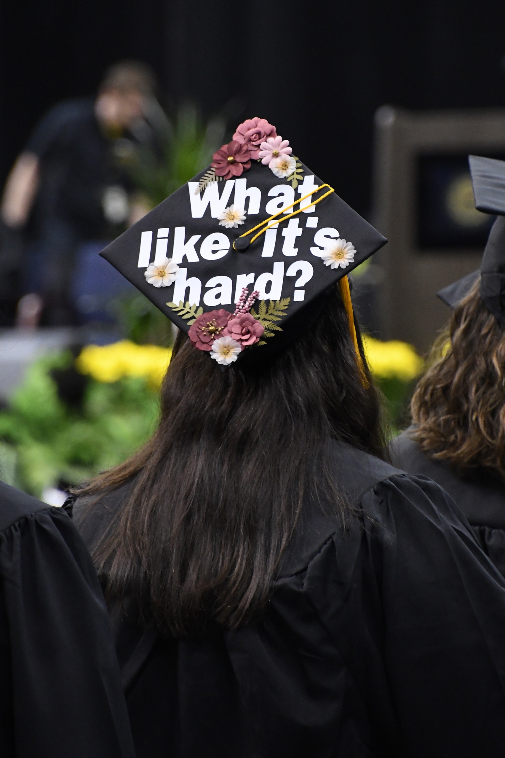 A graduation cap that says "What like it's hard?"
