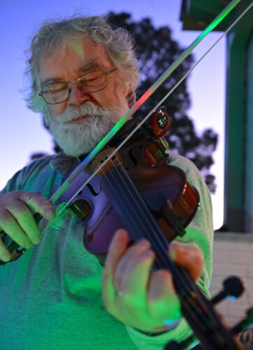 Bluegrass Band Member Playing Fiddle