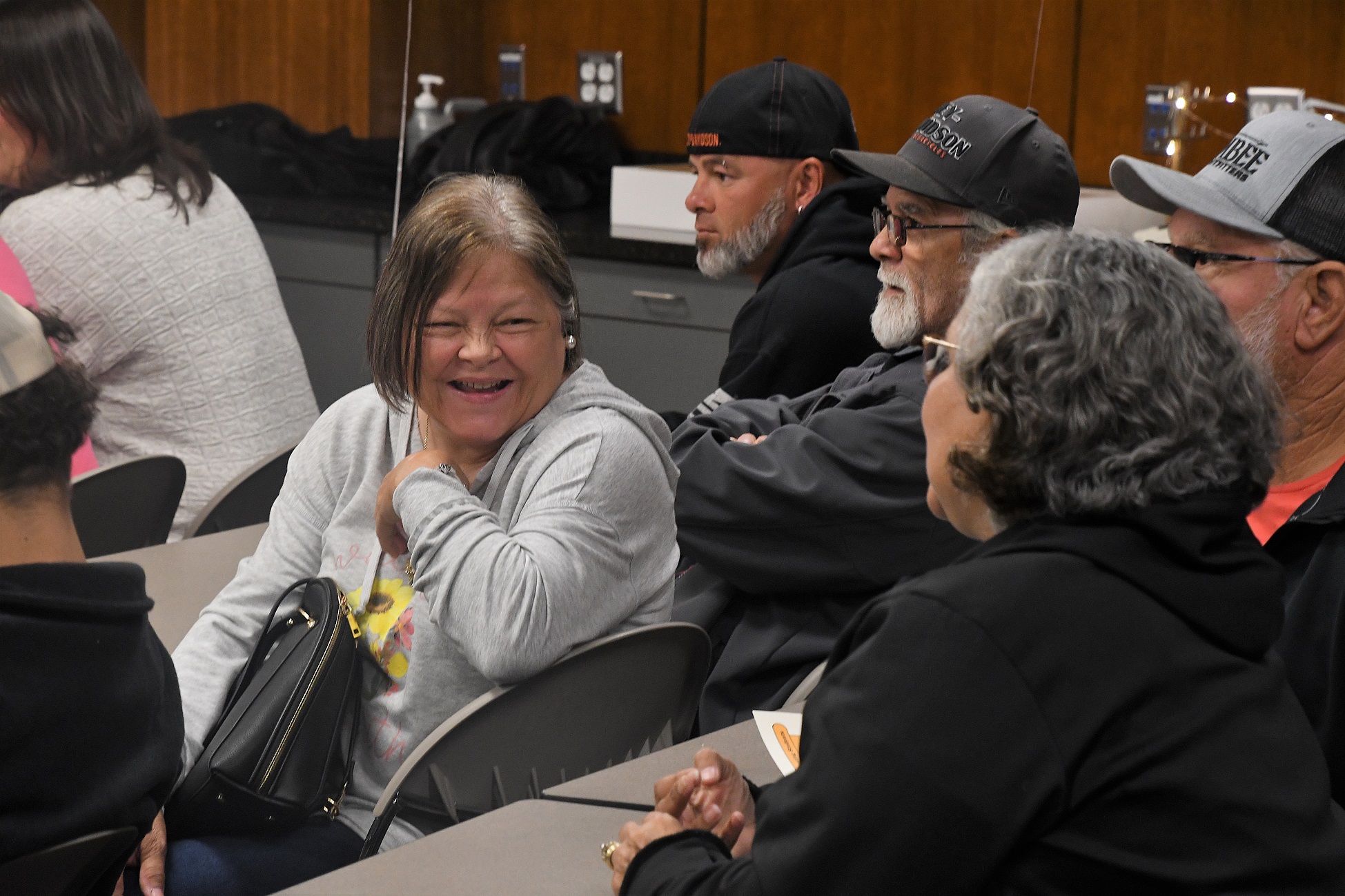 Audience members wait for the graduation ceremony to start.